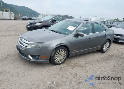 2010 Ford Fusion Hybrid из США, поврежденный, VIN 3FADP0L34AR102024